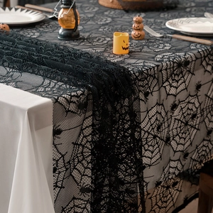 Halloween black lace spider web tablecloth with festive pumpkin decor for party tables