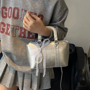Silver metallic bow handbag with pearl charm and lace detail for women crossbody
