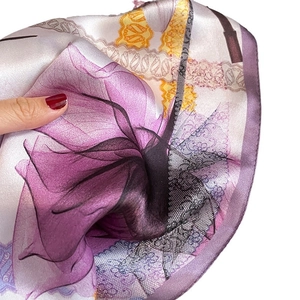 Elegant mulberry silk scarf with purple butterfly print and sheer lightweight texture