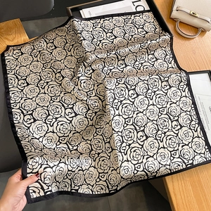 Elegant black and white camellia silk scarf with a soft satin finish for women