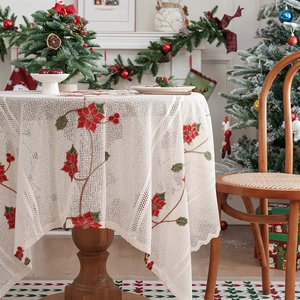 Tovaglia rotonda in pizzo avorio con ricami floreali festivi di poinsettia rossa