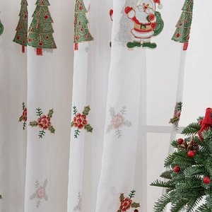 White Christmas sheer curtain featuring festive tree and Santa Claus embroidery art