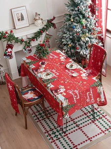 Detailed Christmas tablecloth set with Santa motifs and matching chair covers in red