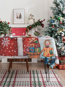 Detailed Christmas tablecloth featuring a winter snowy scene with an illustration of a girl