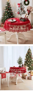 Detail of red hollow lace Christmas tablecloth featuring bells and snowflakes pattern