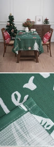 Detail showing the textured fabric weave and fine double-needle stitching of the Xmas tablecloth