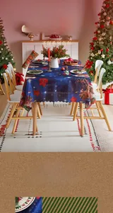 Close-up of laser-cut scalloped edges on star-patterned Christmas floral tablecloth