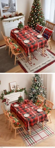 Detailed Christmas dining set featuring red buffalo plaid tablecloth with elk embroidery