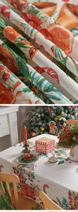 Detail of vintage Christmas tablecloth with red and green plaid patterns and festive print