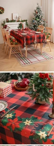 Detail of Christmas buffalo plaid tablecloth with pine needles and golden stars pattern