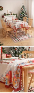 Detail of Christmas tablecloth with red lace edge and winter village print