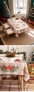 Detail of Christmas tablecloth with poinsettia patterns and scalloped plaid edges
