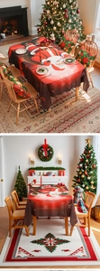 Festive red Christmas tablecloth featuring Santa Claus and snowflakes in a cozy room