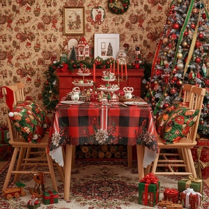 Classic red and black plaid Christmas tablecloth with white floral hem and scalloped edges