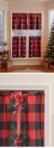 Detail of red and black buffalo plaid Christmas curtains with bows and pine needles print
