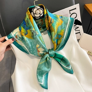 Artistic silk square scarf in green and yellow with a camellia flower brooch accessory