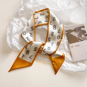 French style silk scarf with number print and orange border on white background