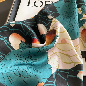 Elegant 2023 silk scarf featuring large peony prints with a satin finish in green and black