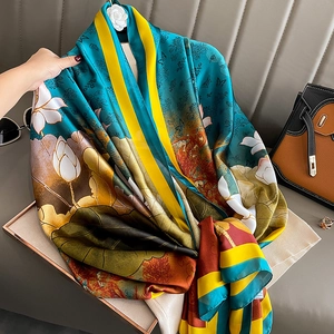 Elegant silk-like scarf featuring classical lotus and butterfly prints in vintage tones