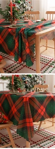 Detail of red and green plaid Christmas tablecloth with scalloped edges for dining decor