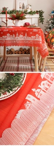 Detailed close-up of red Christmas tablecloth with white snowflakes and scalloped edges