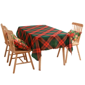 Classic red and green plaid Christmas tablecloth with decorative scalloped edges