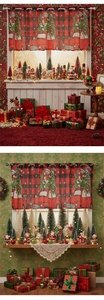Detail of Christmas snowman curtains with vintage truck and classic plaid patterns