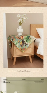 Macro view of vintage abstract floral dust cover on a rustic bedside table