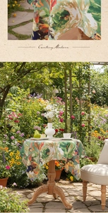 Detail of artistic oil painting floral tablecloth with lush green leaves and vibrant blooms