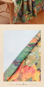 Macro detail of oil painting floral tablecloth showing fine stitching and linen texture