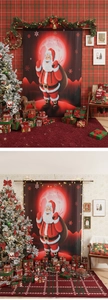 Detail of Christmas Santa backdrop showing fabric texture and festive wall decoration