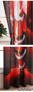 Detail of red and black plaid Christmas curtain featuring Santa Claus and snowflake motifs