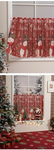 Detail of red Christmas cafe curtain featuring snowman prints and Merry Christmas text