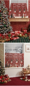Close-up of red Christmas cafe curtain with snowman patterns and Merry Christmas text