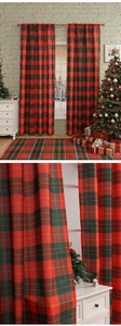 Close-up of red and green plaid Christmas curtains showing textured weave and fabric detail