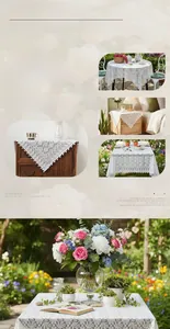 Detail of white lace tablecloth showing intricate floral crochet and hollow-out patterns