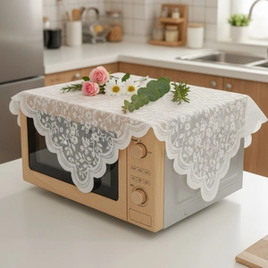 Elegant white floral lace dust cover for microwave oven with scalloped edges