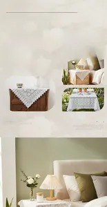Detail of white vintage lace tablecloth featuring floral hollow-out embroidery and wavy edges