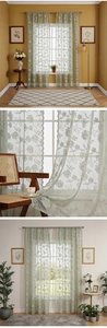 Detail of light green floral embroidered lace sheer curtains with delicate wavy scalloped edges
