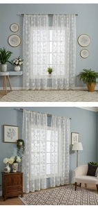 Detailed close-up of white floral embroidery lace sheer curtain with scalloped edges