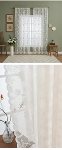 Detail of white floral embroidery and scalloped lace edge on sheer window curtain