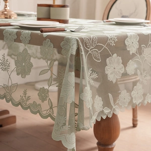 Sage green lace tablecloth with floral embroidery and scalloped edges for dining tables