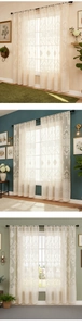 Detailed embroidery on vintage lace curtains featuring delicate floral and scroll patterns