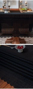 Detail of vintage hollowed geometric pattern and wavy lace edge on premium cotton linen tablecloth