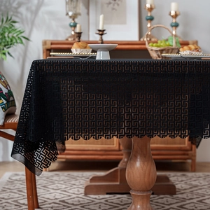 Vintage black lace tablecloth with Greek key pattern and elegant scalloped edges
