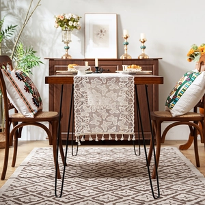 Vintage white lace table runner with floral butterfly patterns and fringe tassels