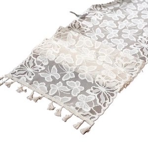 Elegant white lace table runner with butterfly patterns and tassel edges for home decor