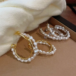 Boucles d'oreilles doubles en perles dorées et argentées avec incrustations de zircons