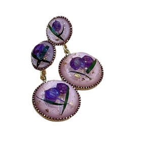 Handmade resin earrings with dried purple flowers and gold foil in gold beaded frame