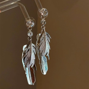 Bohemian 925 silver feather earrings with sparkling crystals and layered leaf fringe